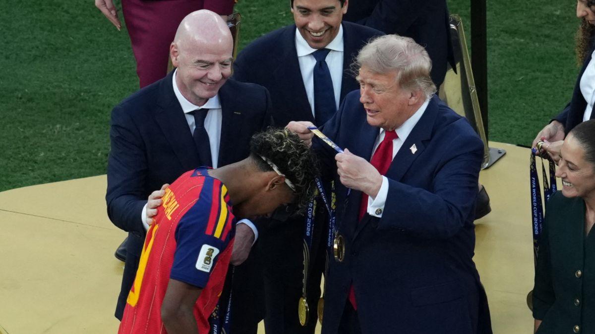 image of Donald Trump appeared to recognize that the spotlight belonged to the players during the trophy presentation.