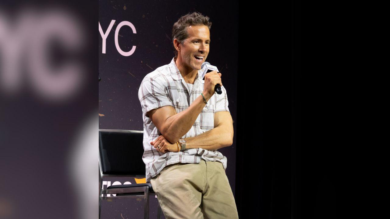Image of Ryan Reynolds celebrated with supporters after the appearance.