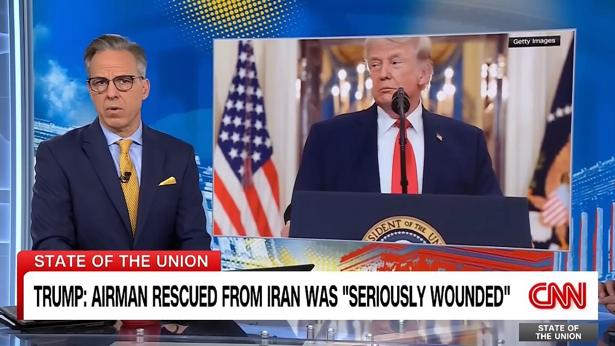 image of Jake Tapper read the Truth Social post aloud. 