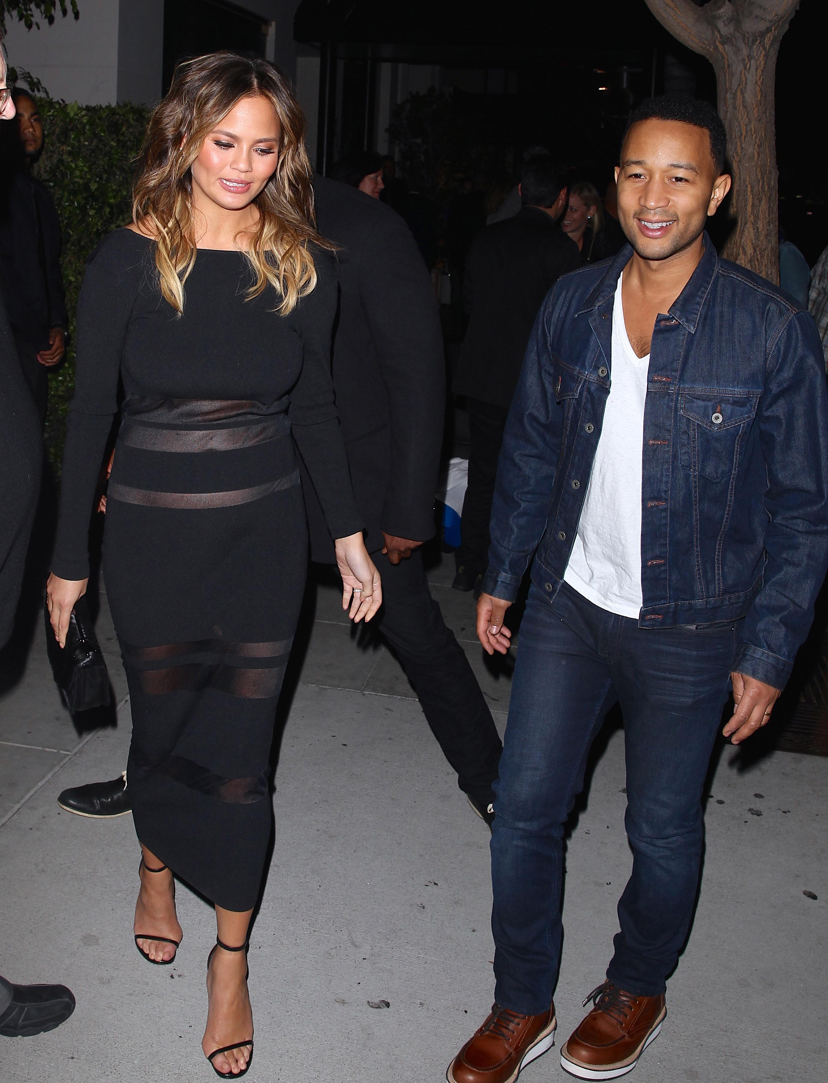 Chrissy Teigen shows off her baby bump after a family dinner at Mastro’s