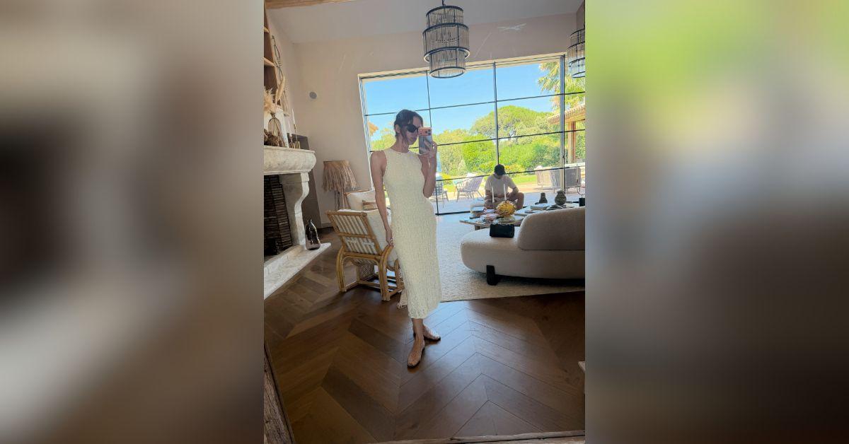 image of The 'Pretty Little Liars' star also posted a second outfit featuring a cream-colored midi dress.