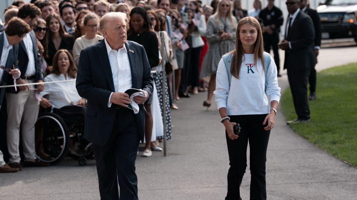 Photo of Donald Trump and Kai Trump