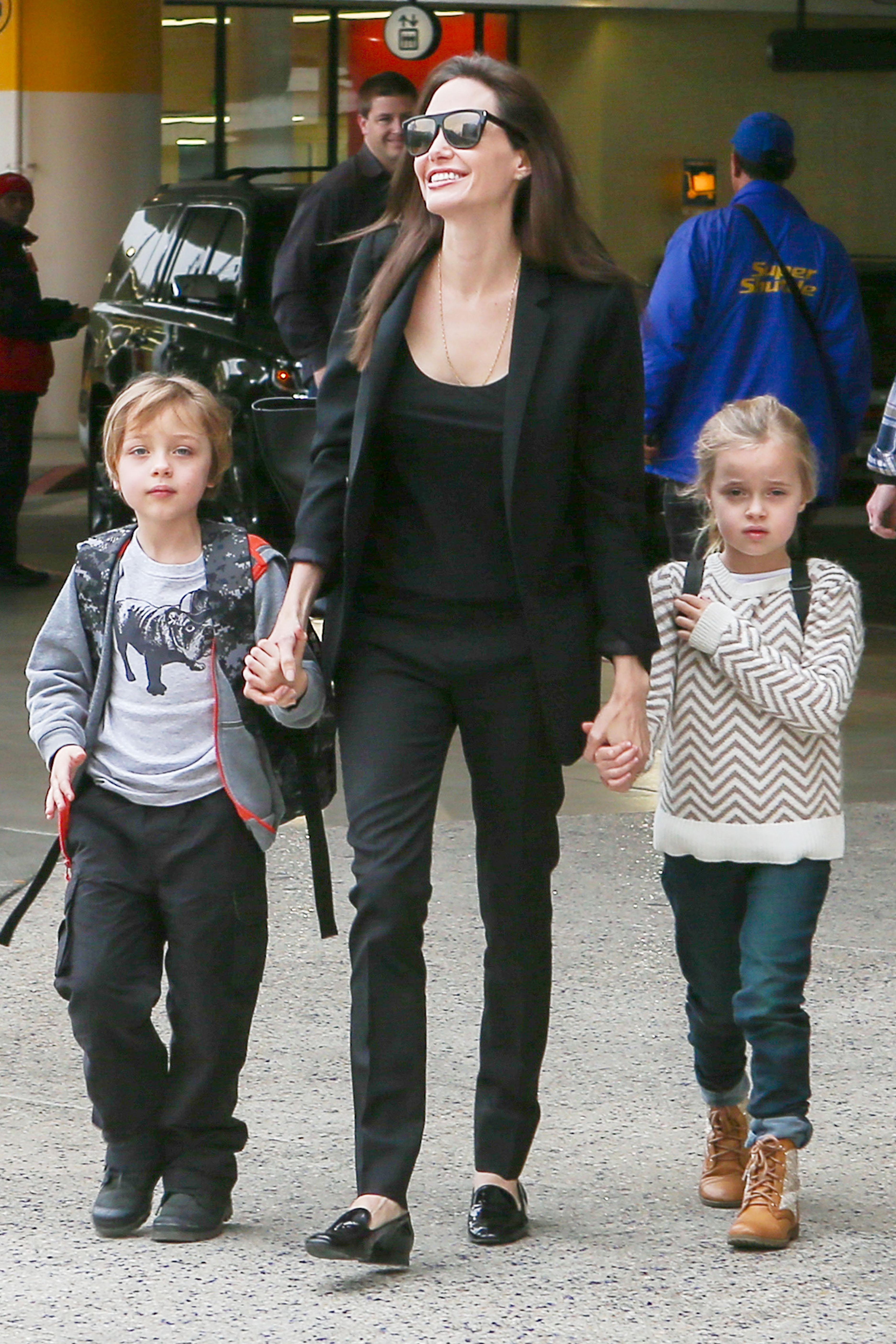 Angelina Jolie At LAX With Sons Maddox And Knox