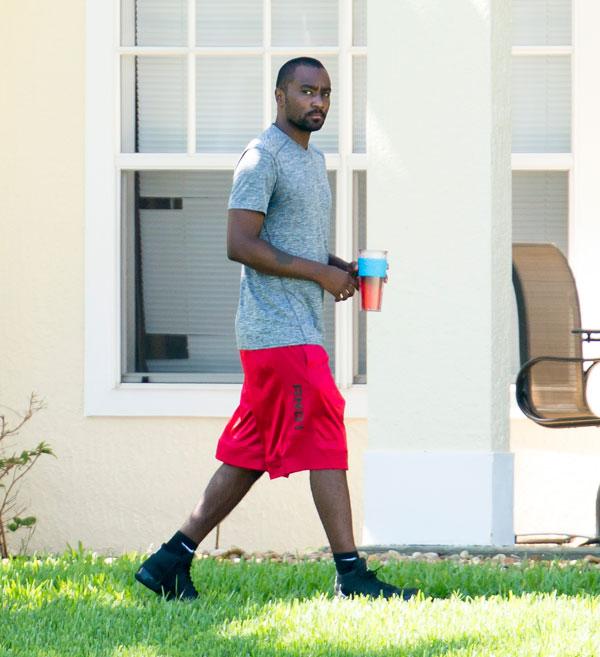 Nick gordon looks confused being served papers lawsuit