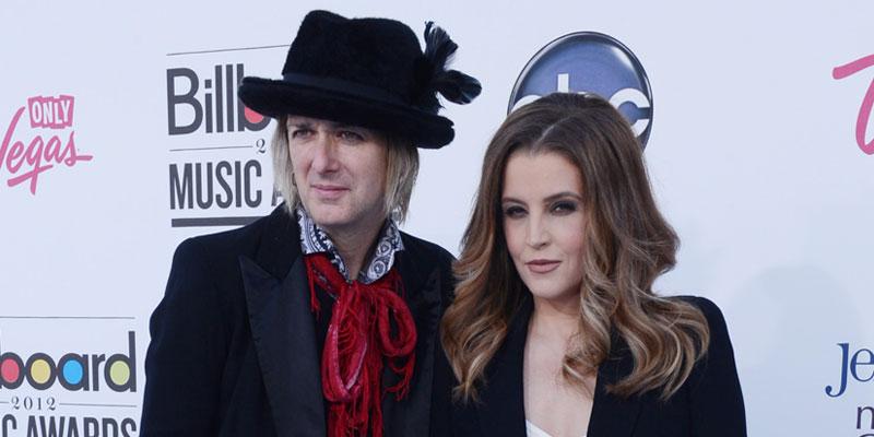 Michael Lockwood Wearing Hat and Lisa Marie Presley wearing Black