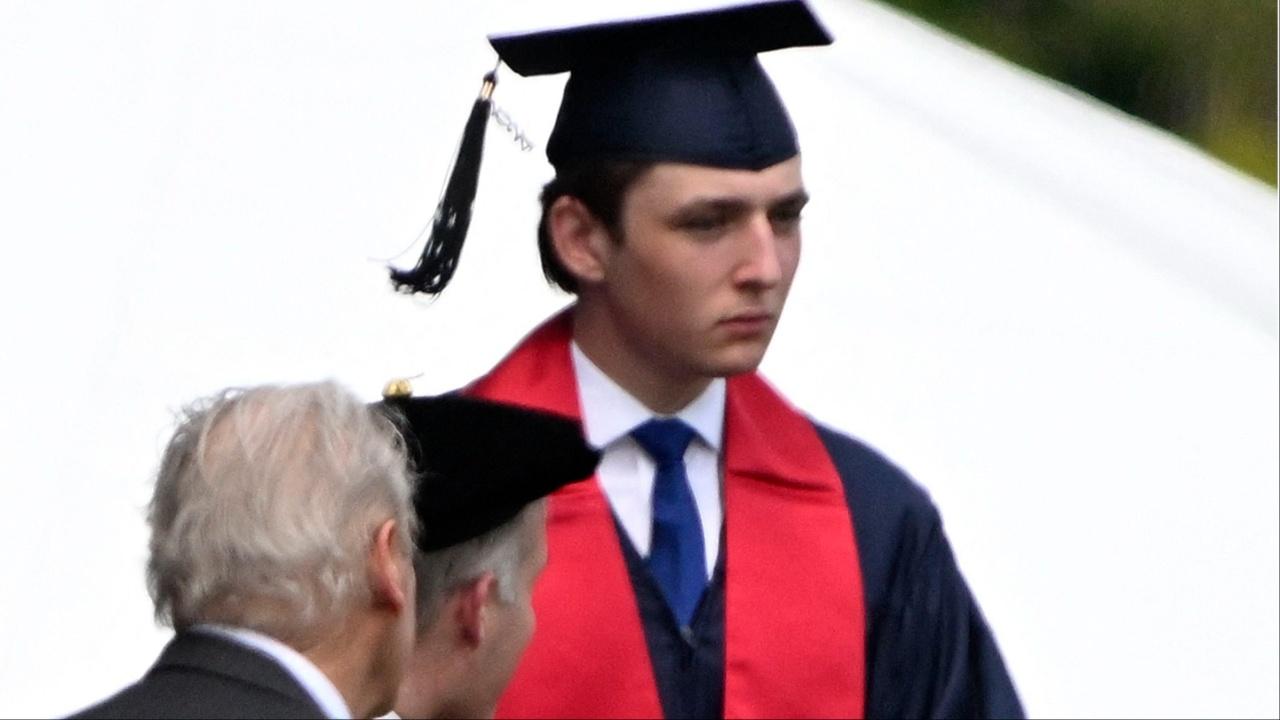 Barron Trump graduates from Oxbridge Academy with parents Donald Trump and Melania Trump watching in West Palm Beach, Florida.