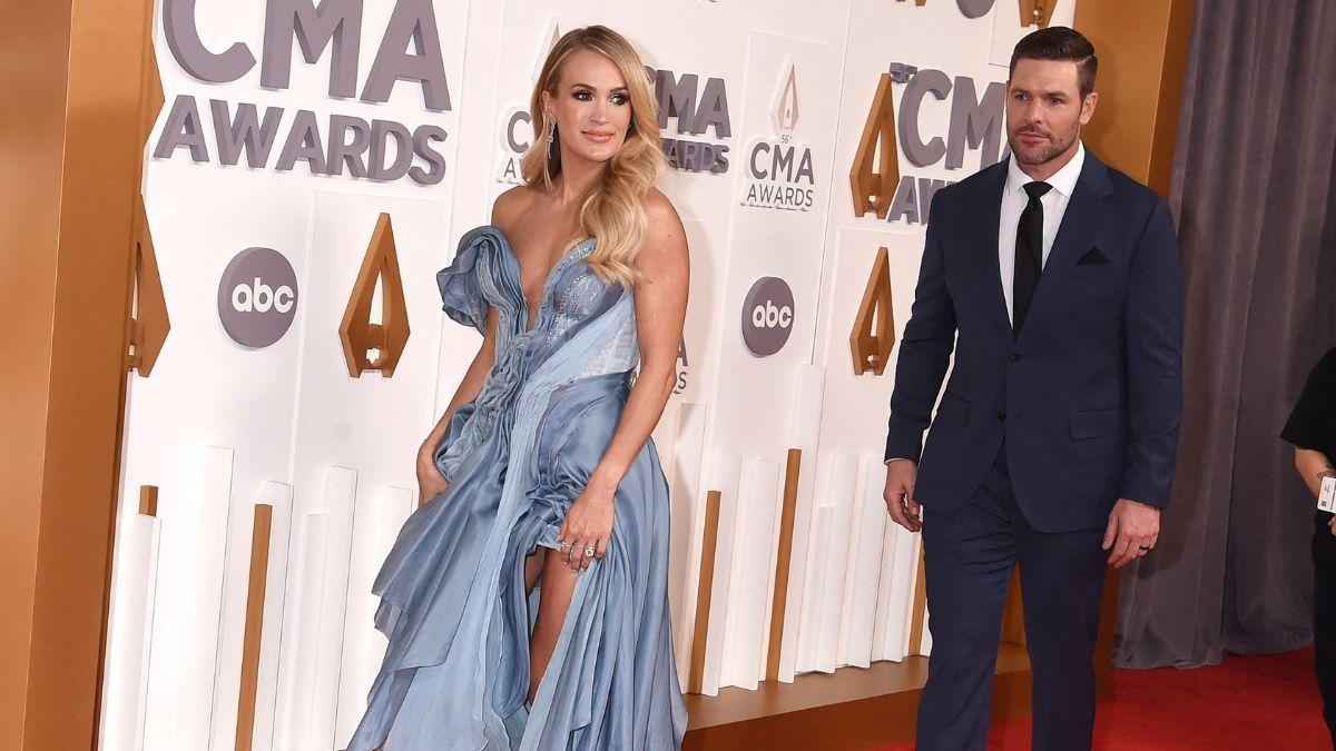 Image of Carrie Underwood and Mike Fisher maintain balance in their lives through their shared faith.