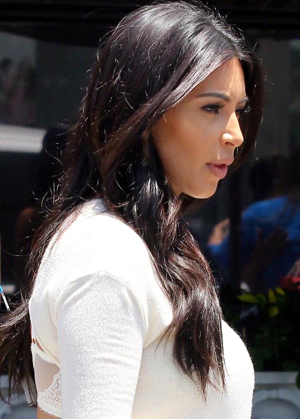 Kim Kardashian Switches Things Up, Debuts a Backless Top WITH a Bra!