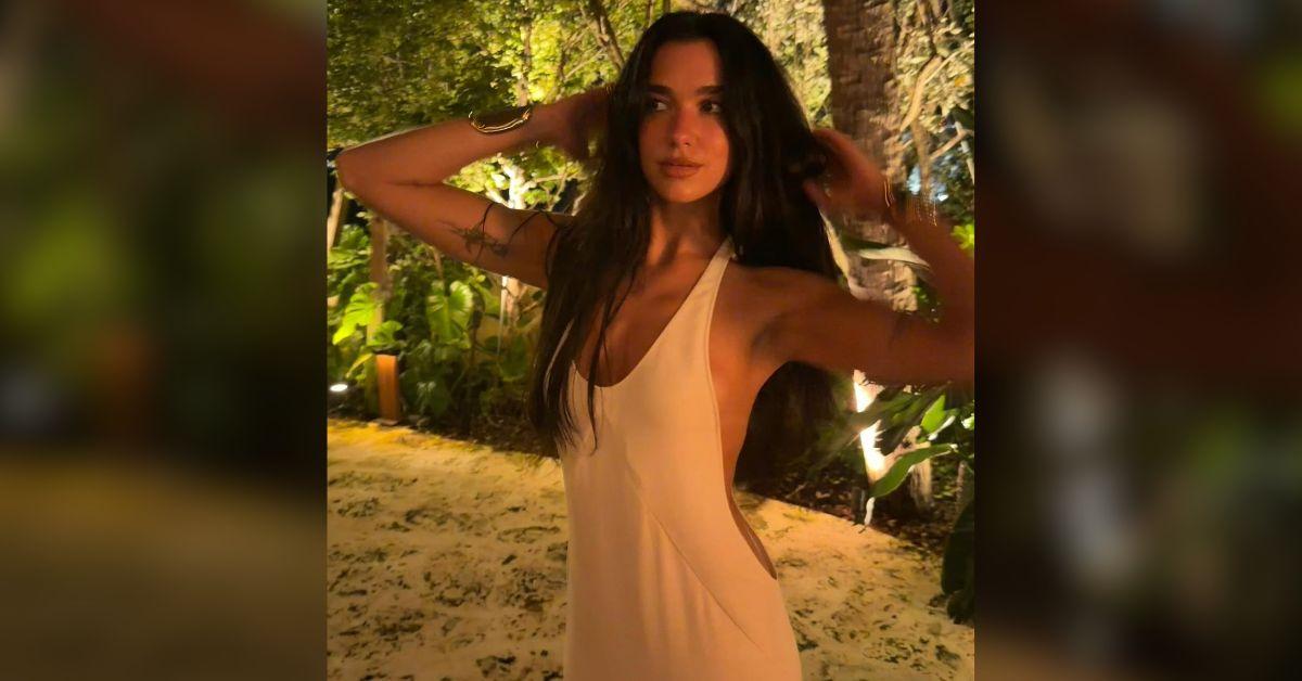 Image of Dua Lipa took the plunge in a long white dress.