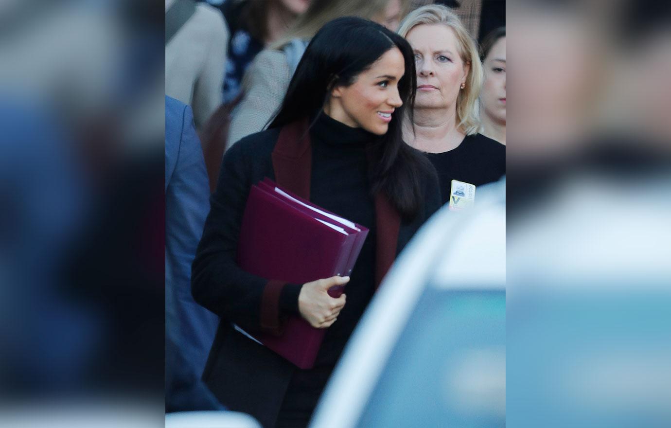 Prince Harry and his wife Meghan Markle pictured arriving in Sydney.