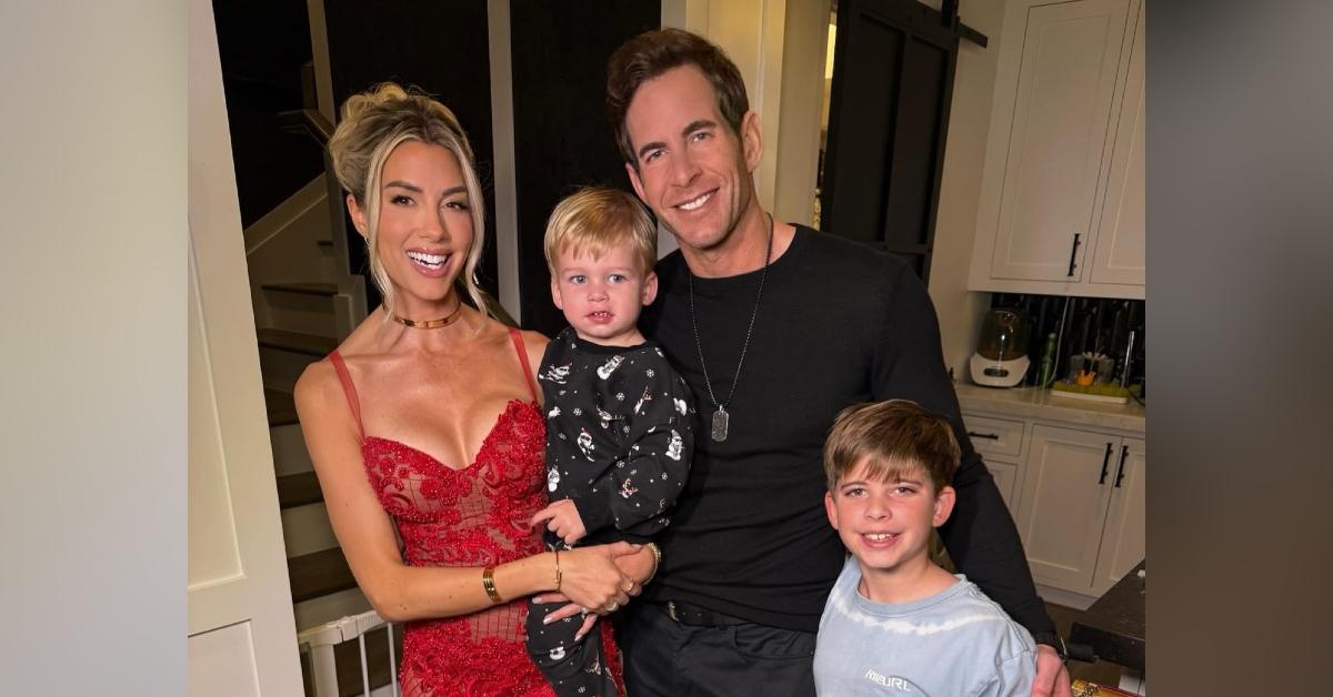 Photo of Heather Rae El Moussa and Tarek El Moussa with Tristan and Brayden El Moussa.