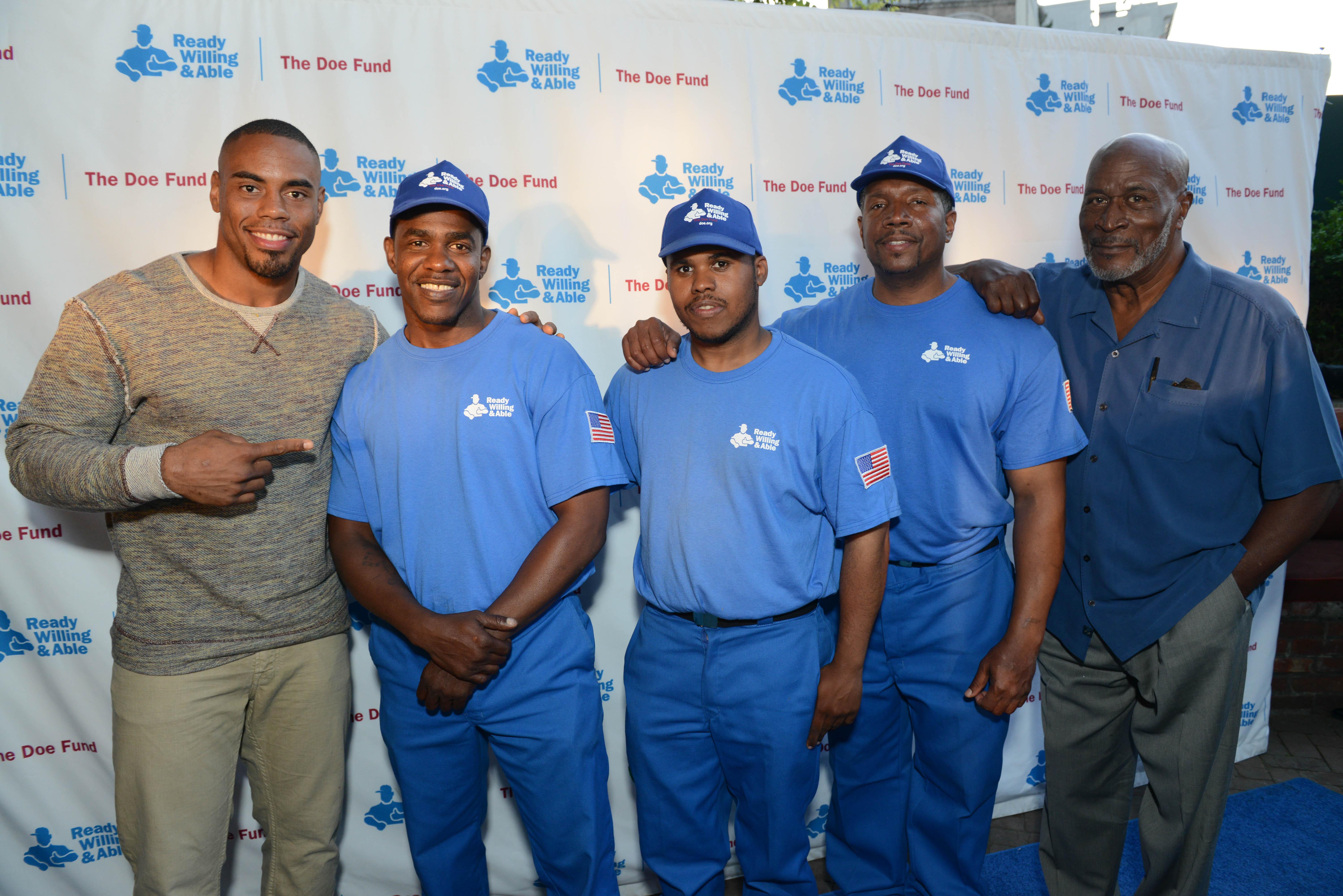 Doe Fund sweet New York_Rashad Jennings and John Amos with Men in Blue_Photo Credit Shahar Azran