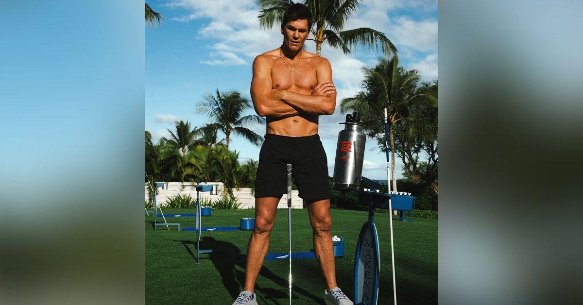 tom brady shows muscles shirtless photo