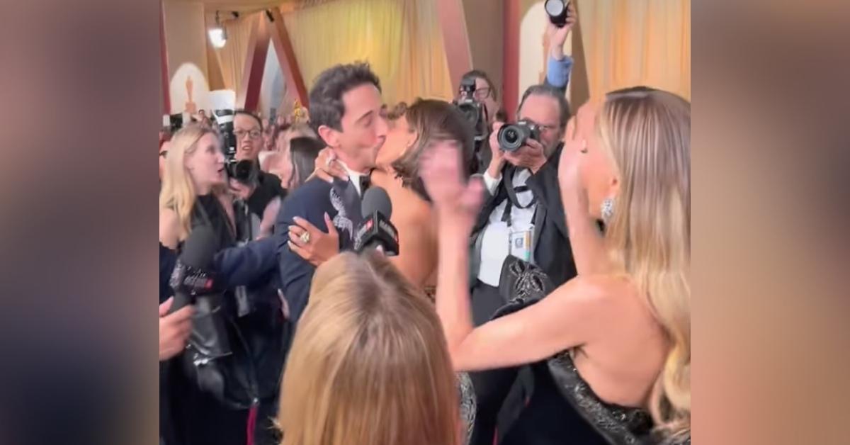 halle berry payback adrien brody unexpectedly kissing  oscars watch