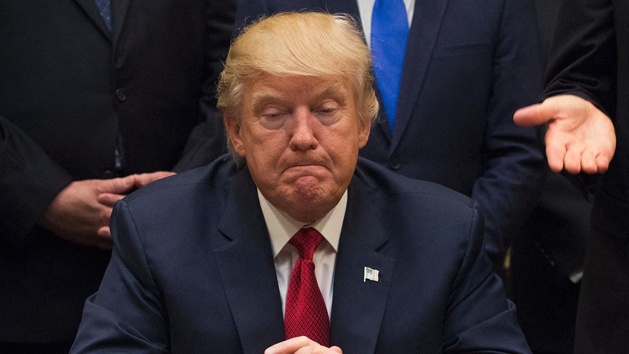 photo of Donald Trump has posted 'mission accomplished' memes despite the war still going on.