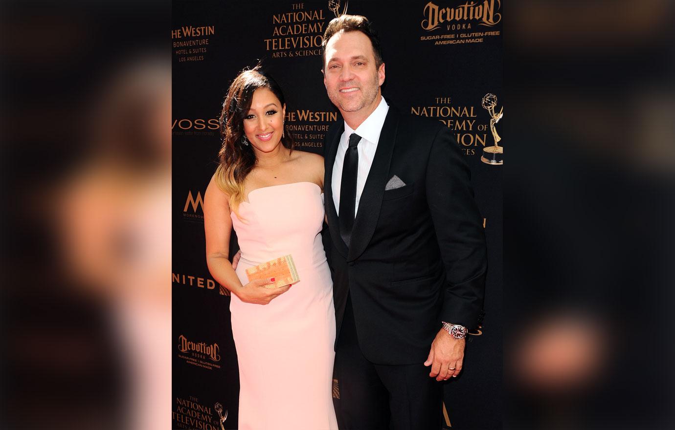 Tamera Mowry Peach Dress With Husband Adam Housley