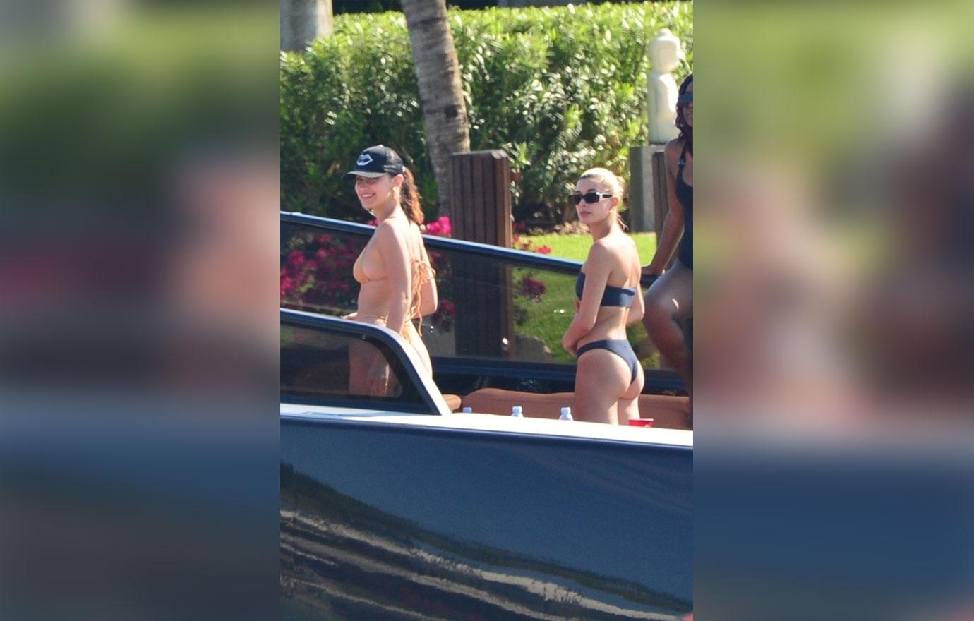 Bella Hadid and Hailey Baldwin arrive back to the marina after a day on The Groot