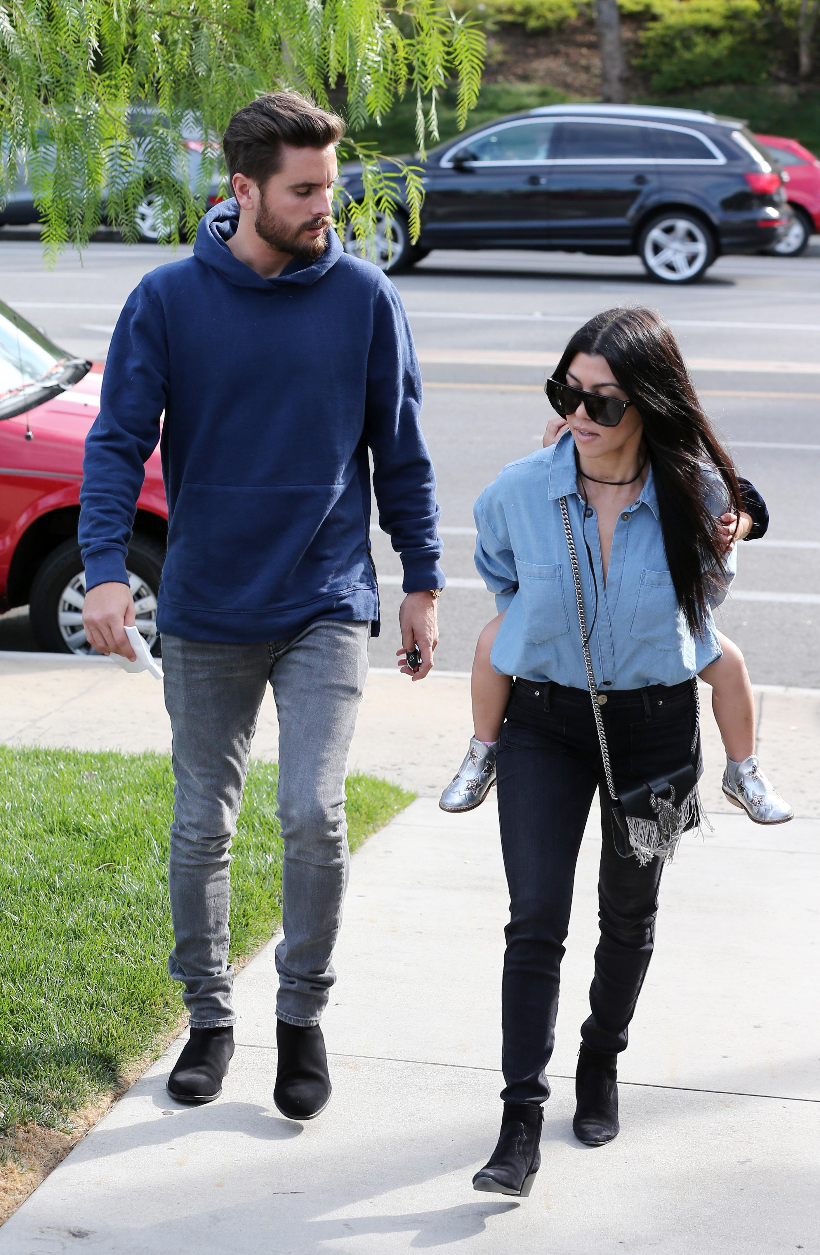 Kourtney Kardashian and Scott Disick leaving with Penelope after having lunch together