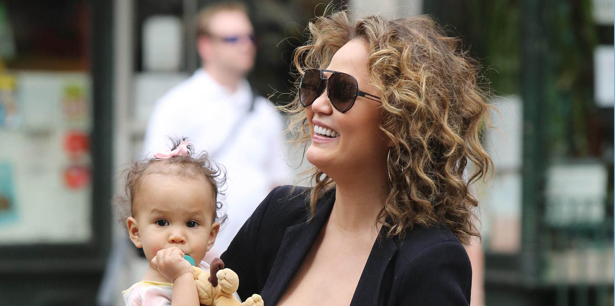 Chrissy Teigen Takes her Daughter on a Walk in Soho