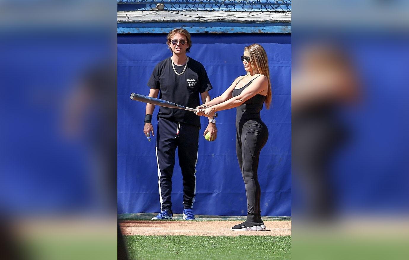 Kim Kardashian Wears Bra Top & Yeezy at Family Softball Game – Footwear News