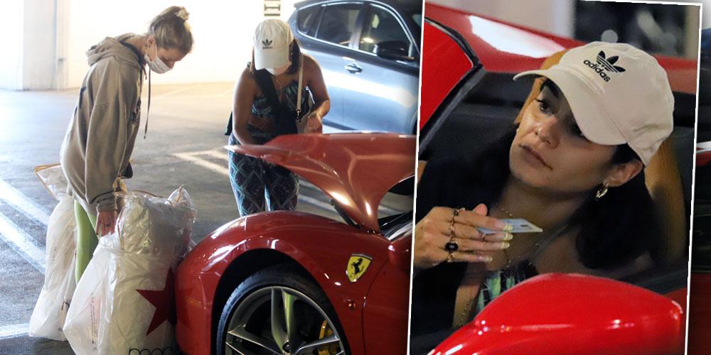 Vanessa Hudgens stuffs her Ferrari after early holiday shopping at the mall.