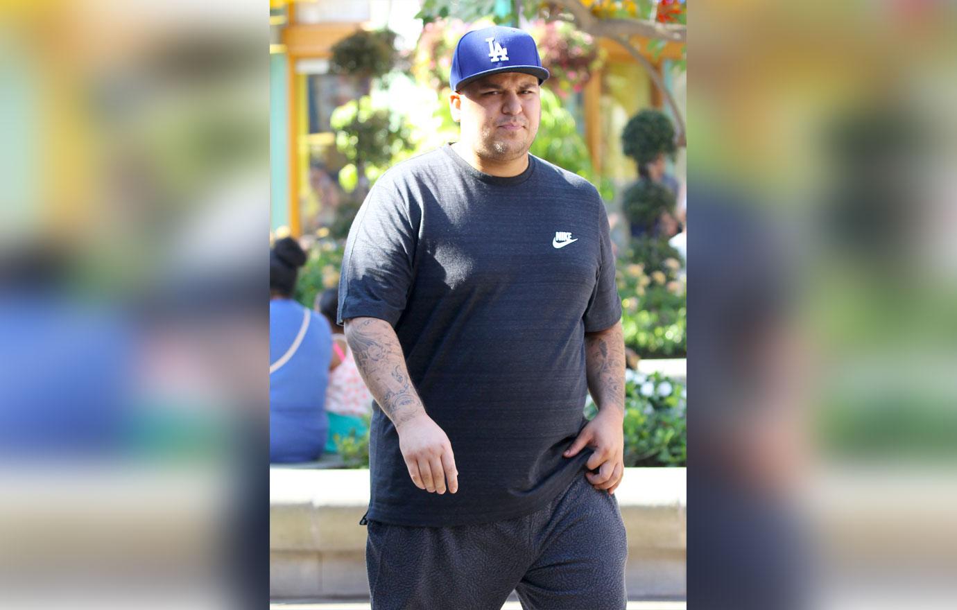 EXCLUSIVE: Rob Kardashian spotted picking up snacks at Wetzels Pretzels in Disneyland