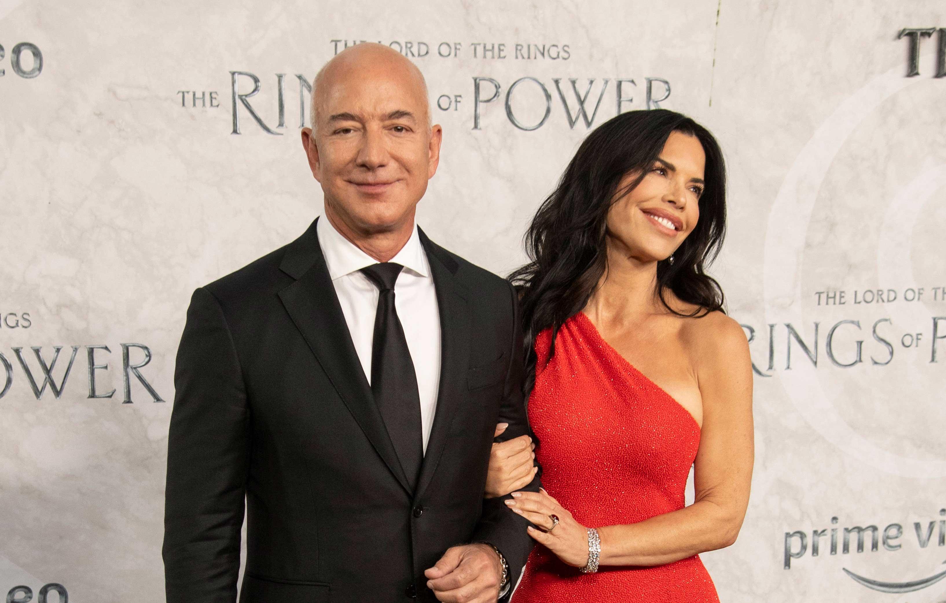 glowing jeff bezos lauren sanchez pack on pda