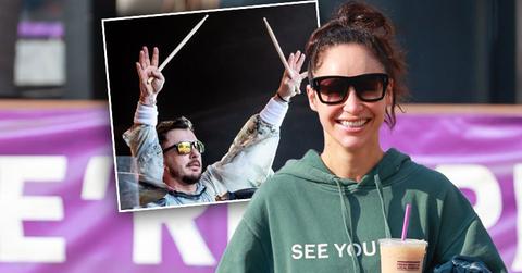Cara Santana rocks a “see you in ‘21” Hoodie as she grabs an iced coffee after the gym. The top Made by Thirty Seconds of Mars