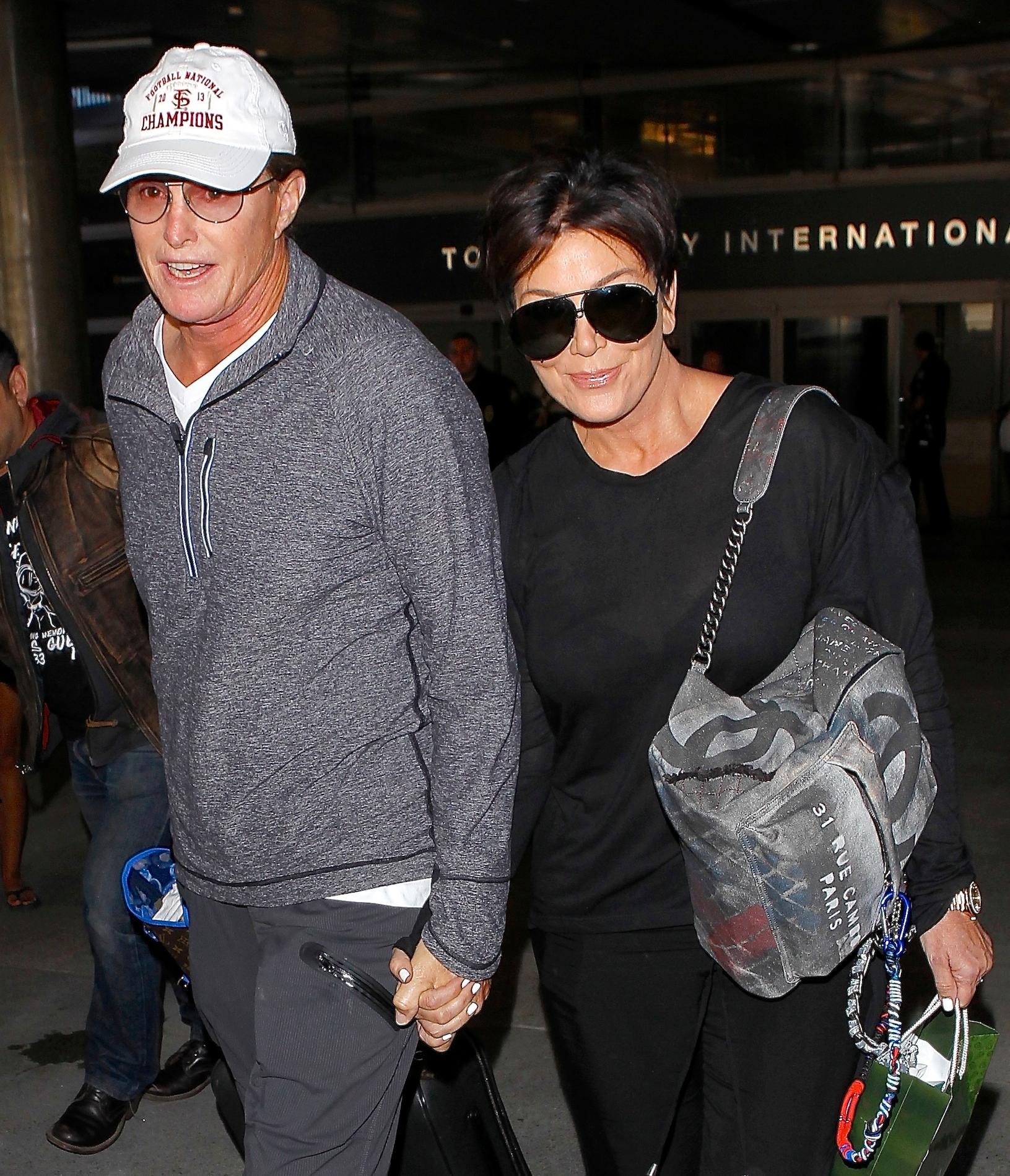 Kris and Bruce Jenner hold hands at LAX