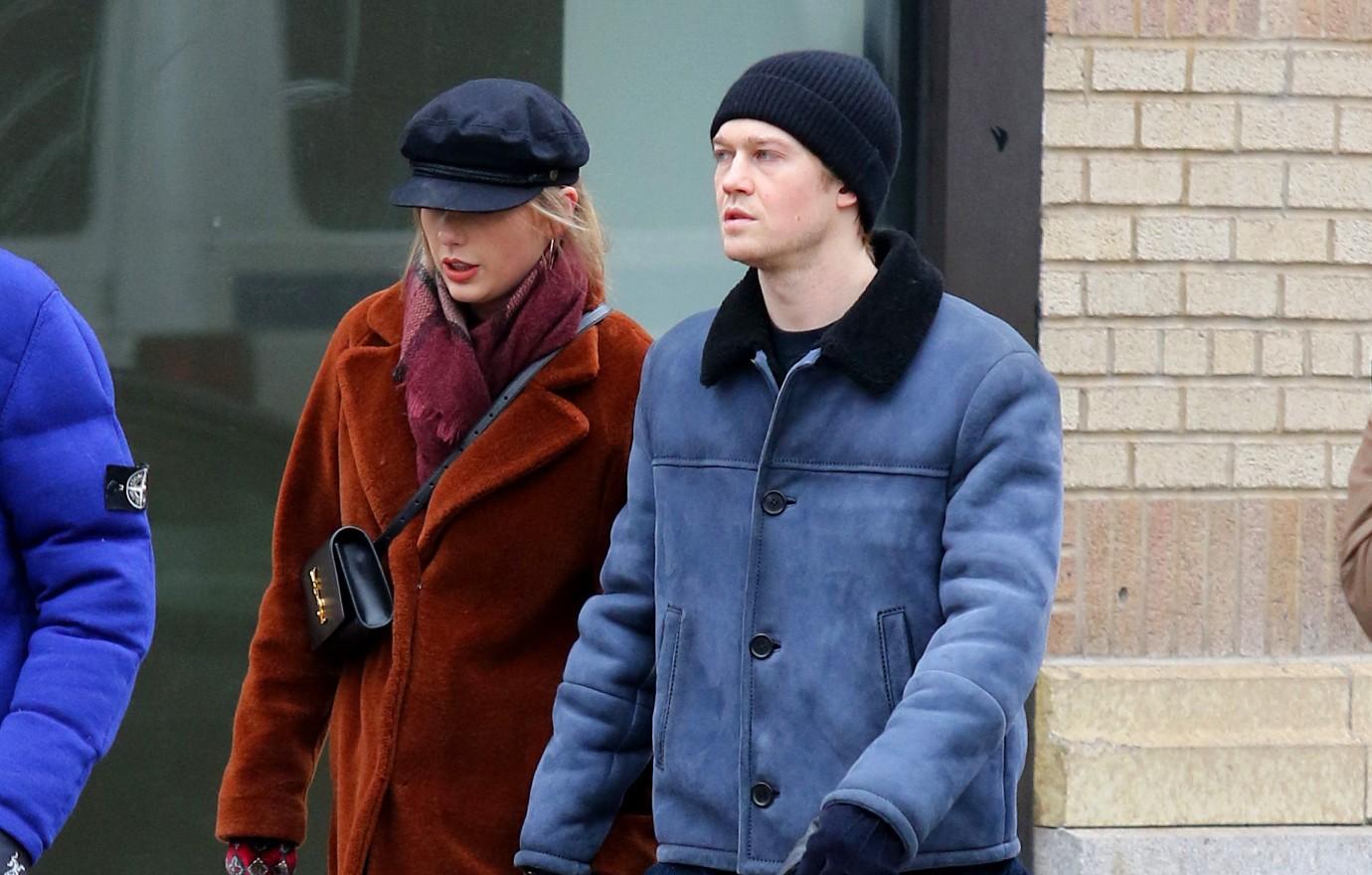 Taylor Swift's beau Matty Healy seen leaving her NYC apartment with an overnight  bag and a Lover hat