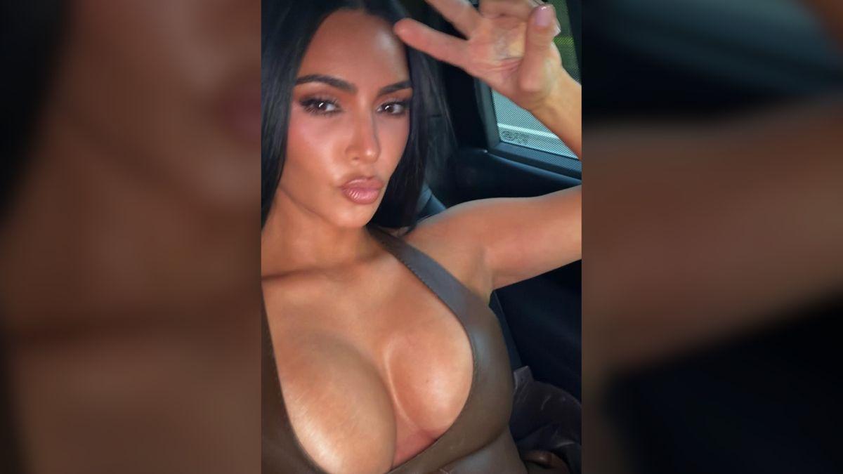 Image of Kim Kardashian flaunted her cleavage in a low-cut top.