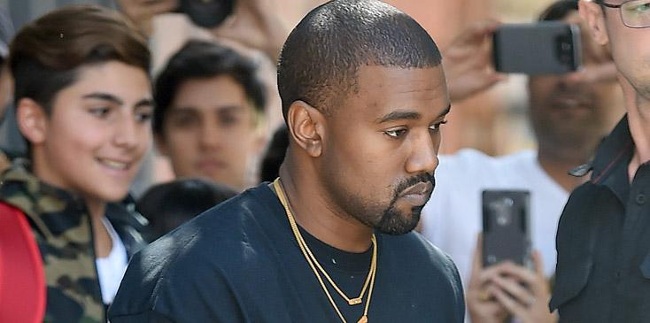 Kanye West seen wearing black clothing and brown boots in New York City