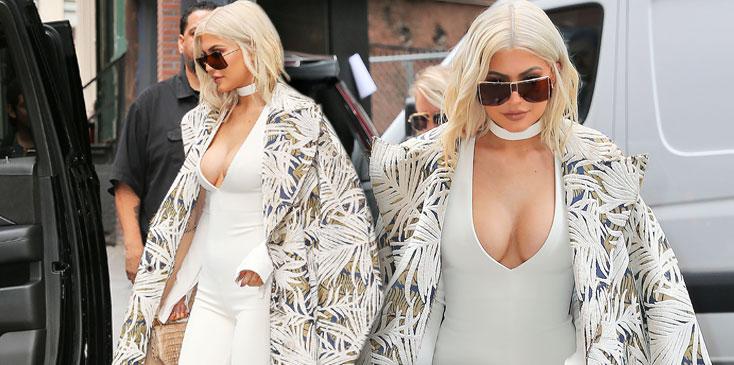 kylie jenner wearing skin tight body suit showing major cleavage