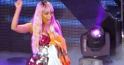 Nicky Minaj Holds Irish Flags While Showing Off Her Large Posterior In Fishnet Bodysuit, In Dublin, Ireland!