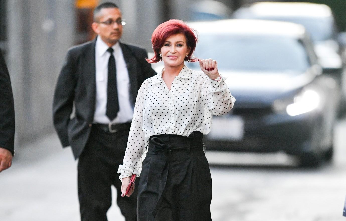 sharon osbourne flashes breast