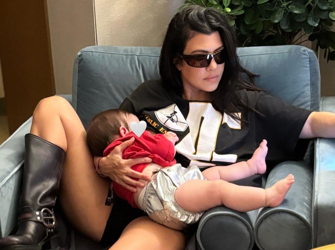 kourtney kardashian divides fans daughter penelope slept bed until