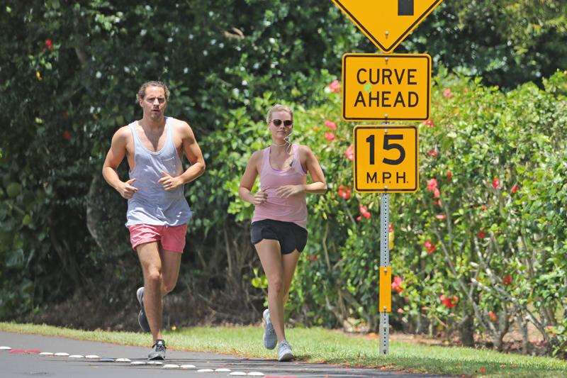 EXCLUSIVE: *NO WEB UNTIL 3.30PM EST, JULY 15, 2016* iMargot Robbie and Tom Ackerley going on a morning jog in Hawaii.