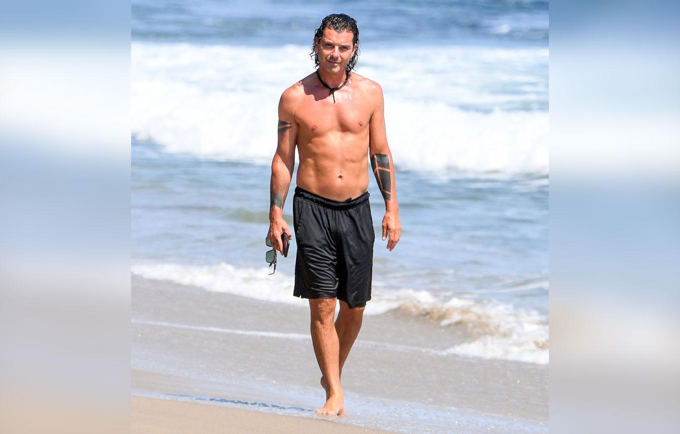 shirtless men on the beach gavin rossdale