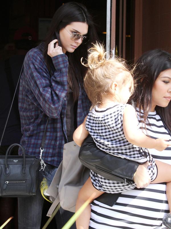 Kourtney Kardashian and Scott Disick take Penelope and Kendall Jenner for lunch in Beverly Hills, CA **NO DAILY MAIL SALES**