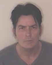 2009__12__aCharlie Sheen Mug Shot 180×225.jpg