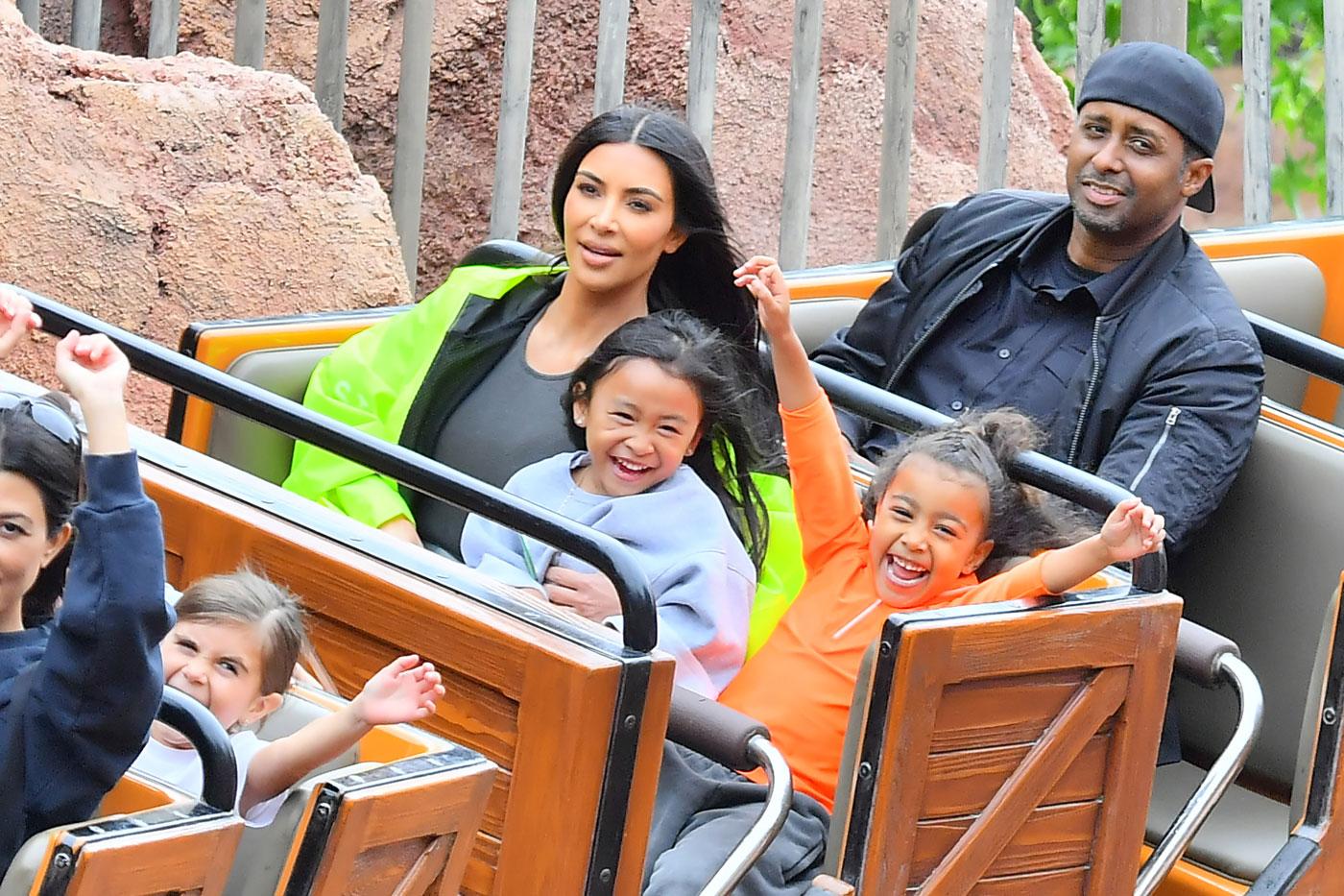 EXCLUSIVE: Kim &amp; Kourtney Kardashian enjoy a day at Disneyland with their kids in Anaheim, CA.