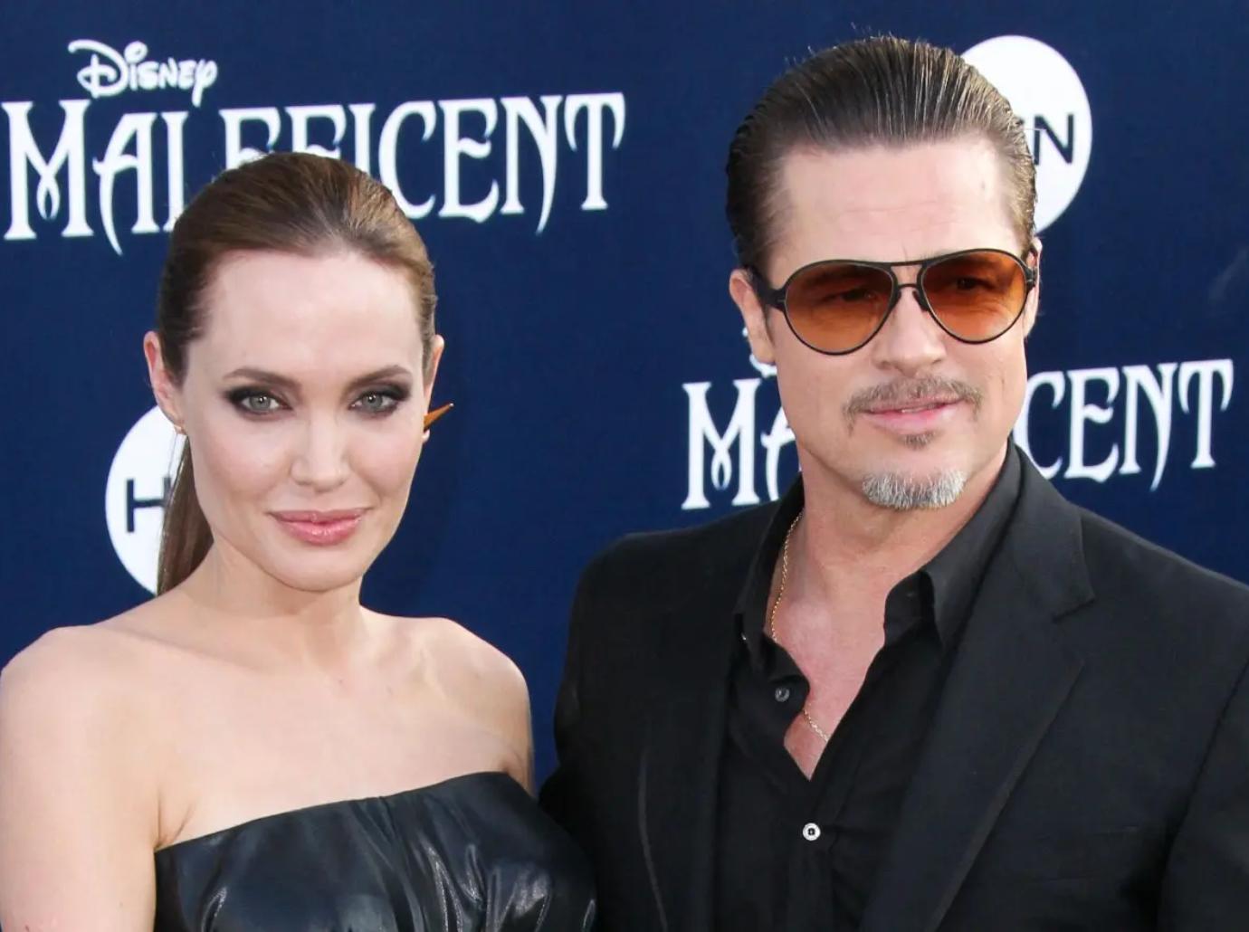 angelina jolie brad pitt withdraw winery lawsuit end fighting family