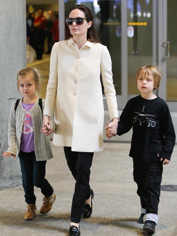 Angelina Jolie and Son Maddox Look Airport Chic at LAX