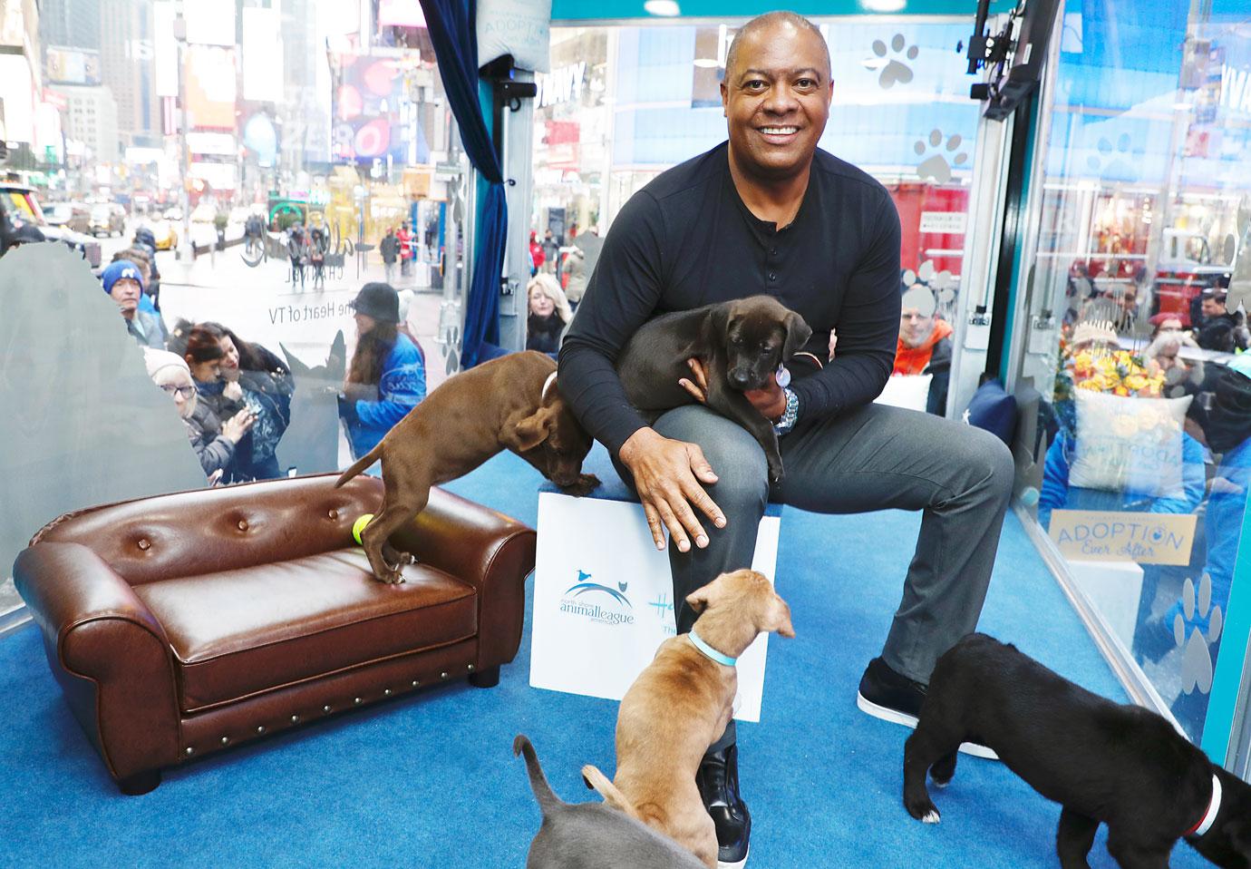 Rodney Peete with Puppies at Adoption Ever After Event