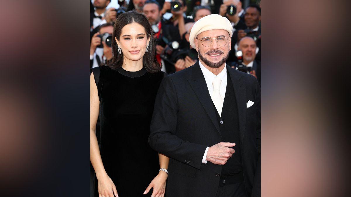 Image of John Travolta attended the Cannes Film Festival with his daughter.