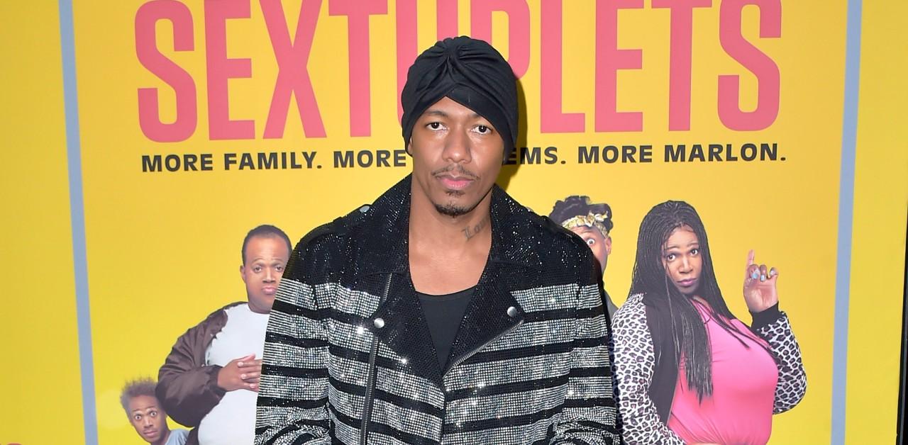 nick cannon snuggles daughter onyx after hospitalized