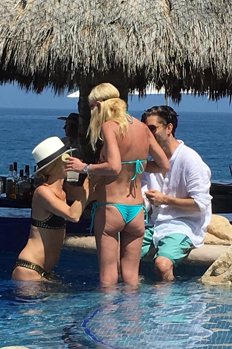 EXCLUSIVE: Tara Reid relaxes in a bikini at her hotel pool during a Mexican getaway