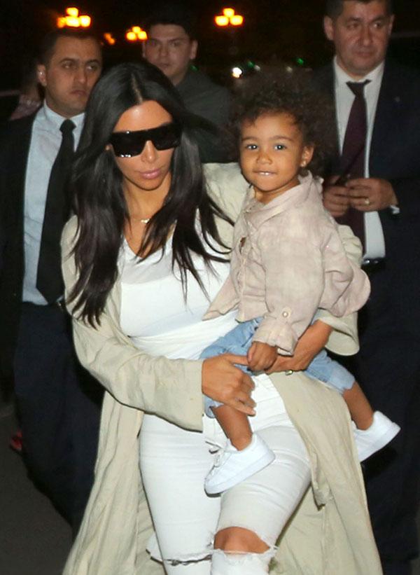 Kim kardashian kanye west adopting5