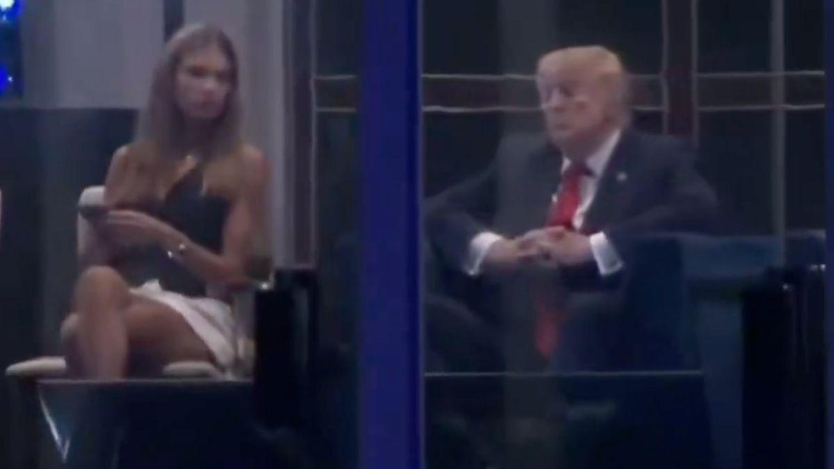 Image of Kai Trump sat next to her grandfather Donald Trump during a lengthy fireworks display.