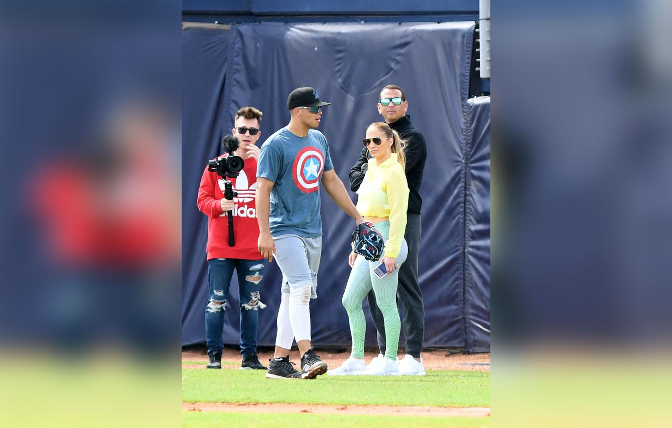 Alex rodriguez and jennifer lopez at baseball field